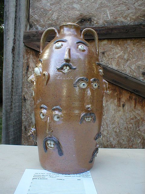 Silent auction multi-faced jug